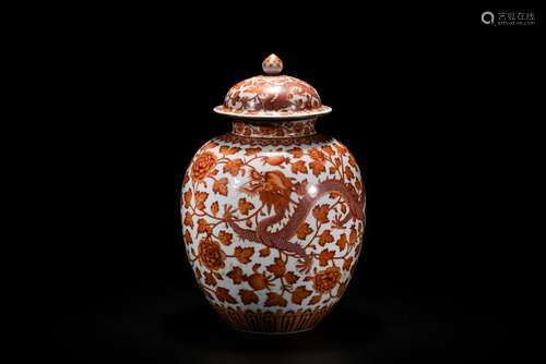 An Iron-Red 'Dragon And Phoenix' Covered Jar