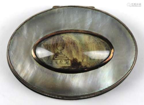 Antique mother of pearl mourning token, of oval form,
