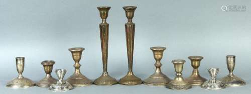 (lot of 9) Sterling silver weighted candlestick group,