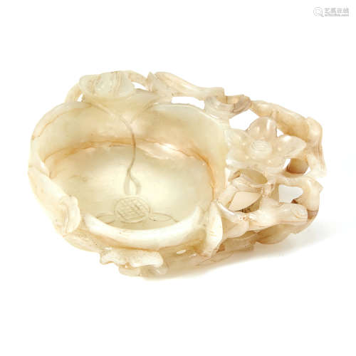 AN ANTIQUE CHINESE WHITE JADE BRUSH WASHER, MING DYNASTY OR LATER carved in the form of a flower,