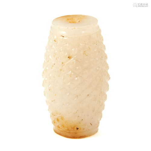 A CHINESE WHITE JADE BEAD of barrel form, carved with textured crosshatch decoration, 4.6cm, 53g.
