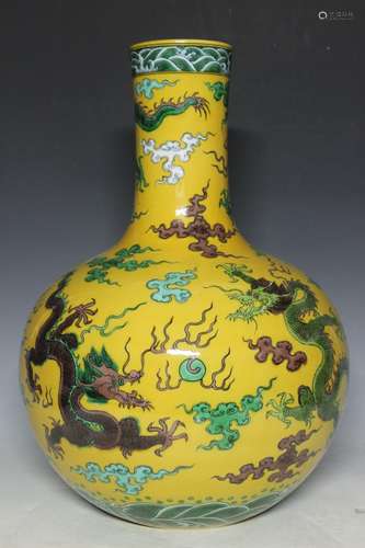 A Yellow Ground Famille Rose Bottle Vase