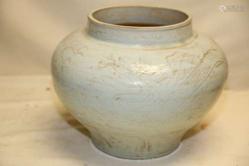 A White Glazed Incised Dragon Porcelain Jar