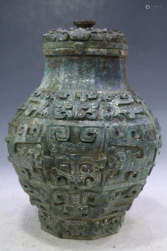 An Archaic Bronze Ritual Storage Vessel and Cover