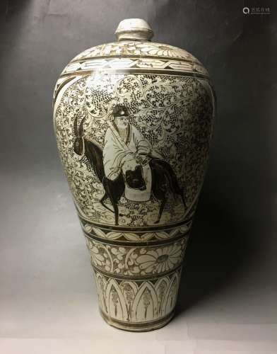 A Cizhou Porcelain Carved Vase