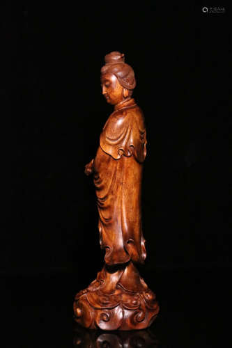 A ROSEWOOD GUANYIN STATUE