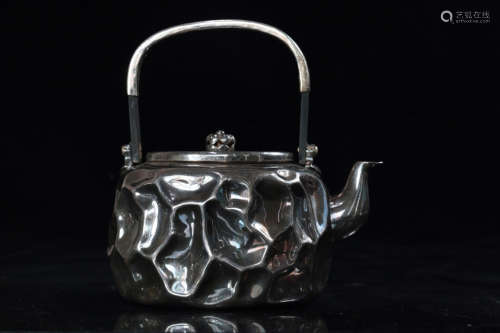 A PURE SILVER TEAPOT