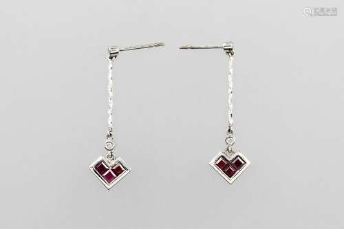 Pair of 18 kt gold earrings with rubies and diamonds