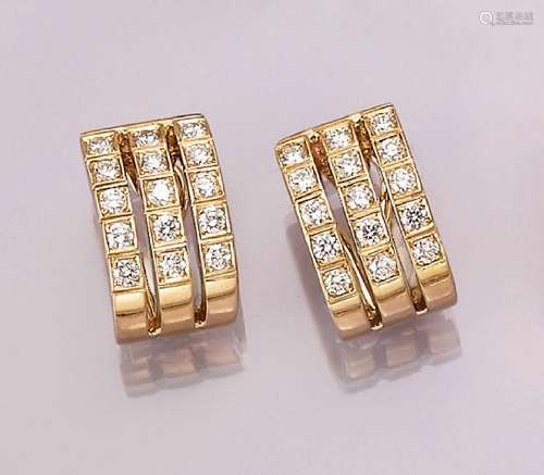 Pair of 18 kt gold earrings with brilliants