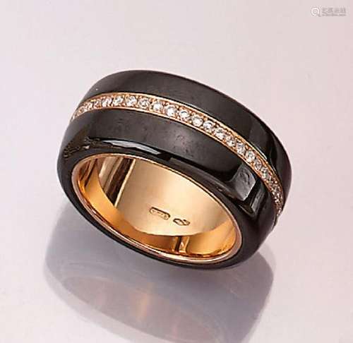 18 kt gold ring with brilliants and onyx