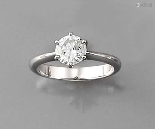 18 kt gold solitaire ring with brilliant