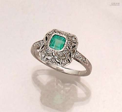 Platinum Art Deco ring with emerald and diamonds