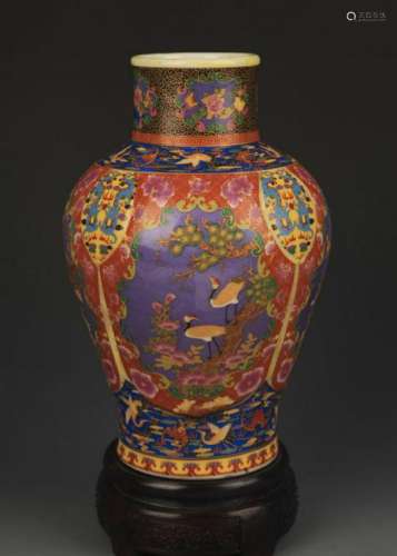 A FAIENCE COLOR FLOWER AND BIRD PAINTED VASE
