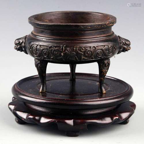 A FLOWER CARVING HIGH FOOT BRONZE CENSER