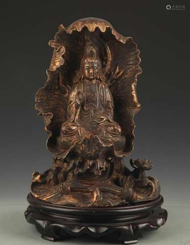 A BRONZE LOTUS GUAN YIN STATUE