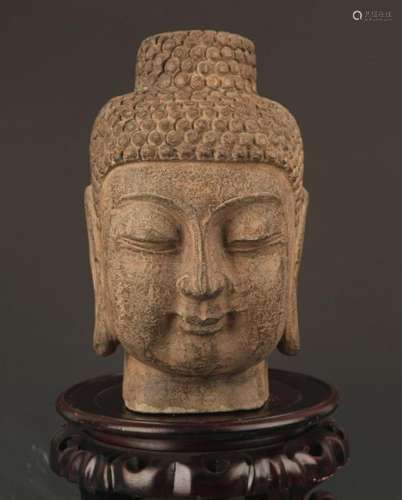 A FINELY CARVED STONE BUDDHA HEAD