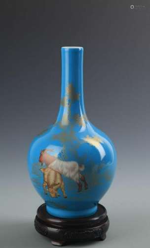 A BLUE GLAZED GILT FINELY PAINTED PORCELAIN VASE