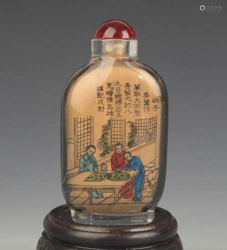 A CHARACTER PAINTED GLASS SNUFF BOTTLE