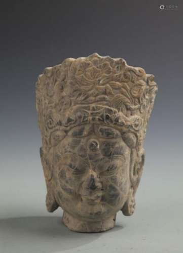 A FINELY CARVED GUAN YIN STONE HEAD
