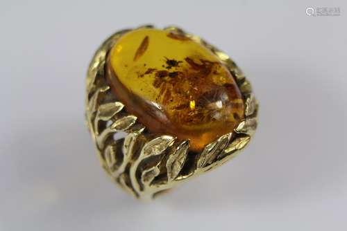 A Gentleman's Bespoke 18ct Yellow Gold and Amber Ring