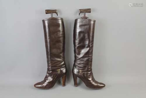 A Pair of Gucci Calf Length Boots