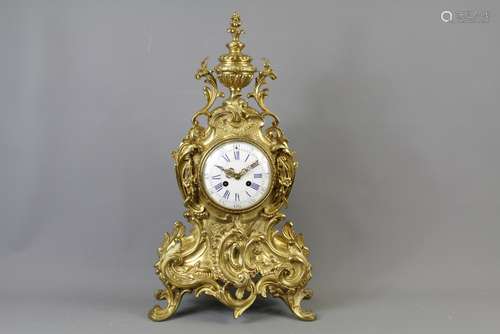 A.D. Mougnin et Cie, A Mid 19th Century French Gilt/Brass Mantle Clock