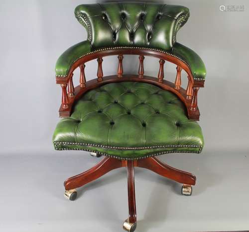 A Green Leather Captain's Chair