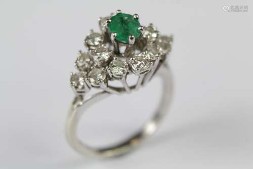 A 14ct White Gold Emerald and Diamond Ring