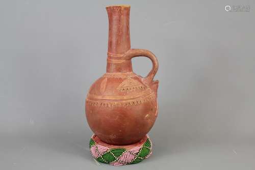 A Peruvian Terracotta Gourd