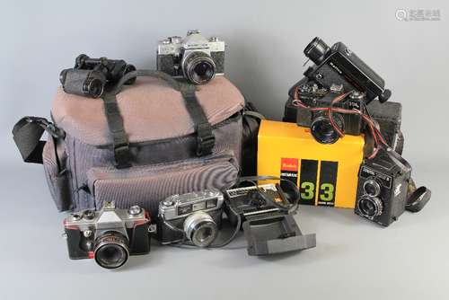 A Three Box Quantity of Vintage Camera's, Binoculars and Cine-Cameras