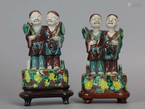 pair of Chinese sancai glazed porcelain boys, 19th c.