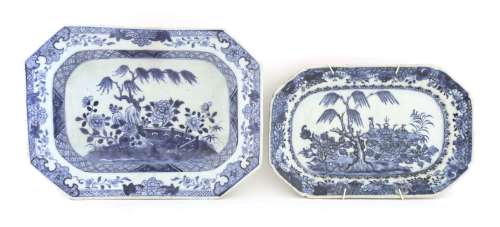 A Chinese blue and white rectangular platter,18th century, painted with shrubs in a rocky garden,