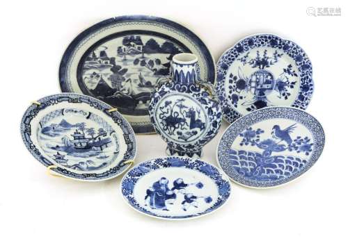 A group of Chinese blue and white porcelain:a charger,19th century, painted with a watery