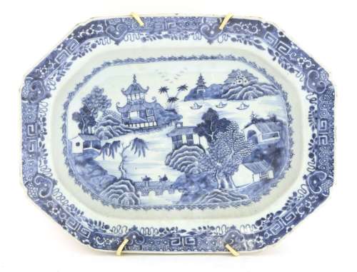 A Chinese blue and white rectangular platter,18th century, painted with a watery landscape with a