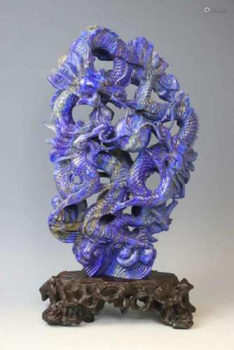 A LAZULI CARVED DRAGON SHAPED ORNAMENT WITH BASE