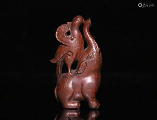 A BAMBOO CARVED AUSPICIOUS SHAPED PENDANT