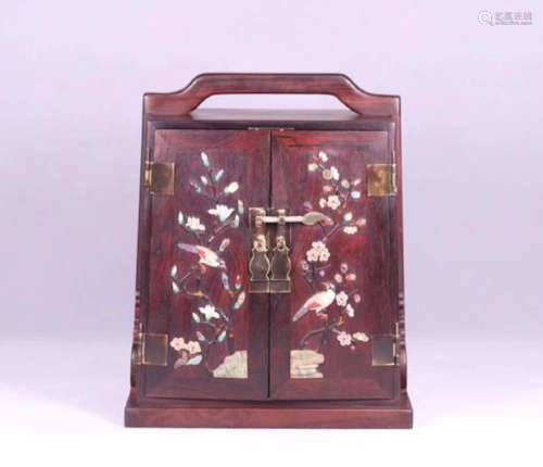A WOOD CARVED GEM DECORATED MAGPIE PATTERN CABINET