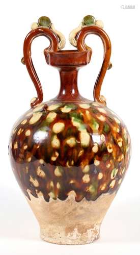 A Chinese sancai glazed terracotta two-handled vase, 33cms (14ins) high.