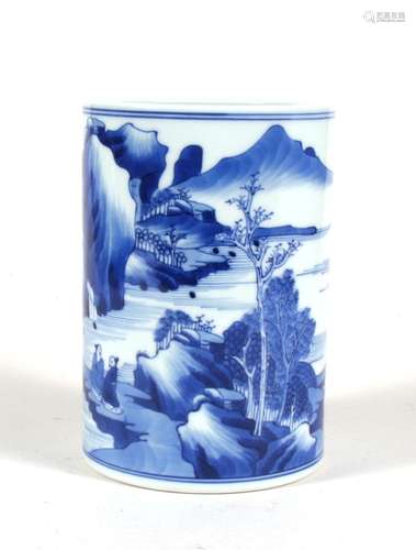 A Chinese blue & white brush washer decorated with figures in a landscape, 14cms (5.5ins) high.