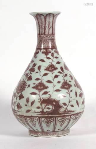 A Chinese Ming style vase decorated with flowers and foliage, 33cms (13ins) high.Condition Report