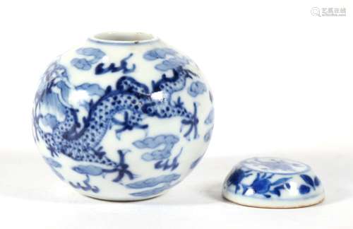 A Chinese blue & white miniature ginger jar decorated with dragons amongst clouds chasing pearls,