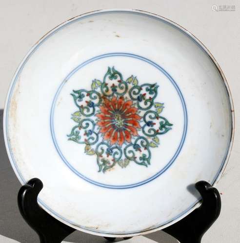 A small Chinese Doucai shallow footed dish with blue seal mark to underside, 15.5cms (6ins)