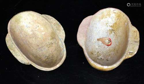 A pair of Chinese glazed ear cups, probably Han dynasty, 10.5cms (4.1ins) wide.