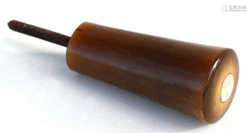 A 19th century rhino horn walking stick handle with inset mother of pearl top.Condition