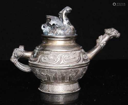 A Chinese white metal miniature teapot with dragon finial and spout, impressed mark to underside,