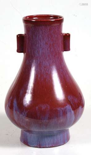 A Chinese sang de boeuf glazed vase, impressed 4-character mark to underside, 25cms (13.75ins)