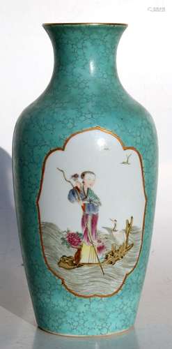 A Chinese famille rose vase decorated with figure within panels on a turquoise ground, red seal mark