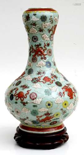 A large Chinese vase decorated with bats amongst clouds with flowers and foliate sprays, red seal