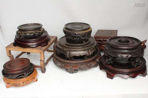 A quantity of Chinese hardwood vase stands (13).Condition Report Damage or loss to four as pictured,