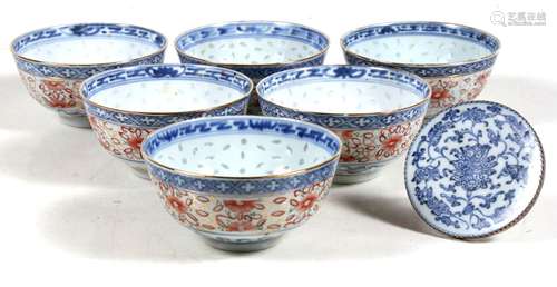 A Chinese silver mounted blue & white plaque decorated with flowers; together with a set of six